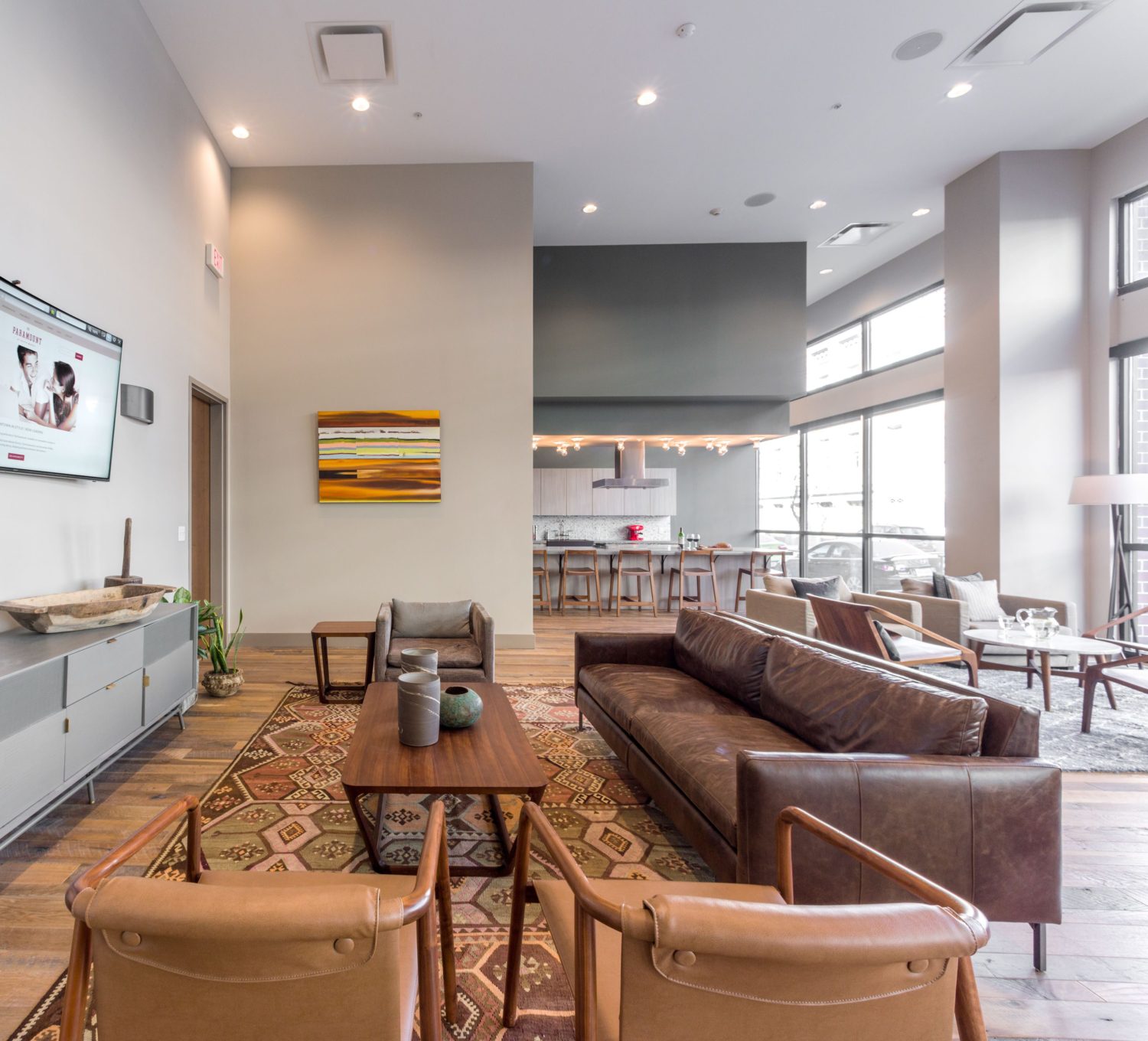 Paramount clubhouse with large TV and stylish seating