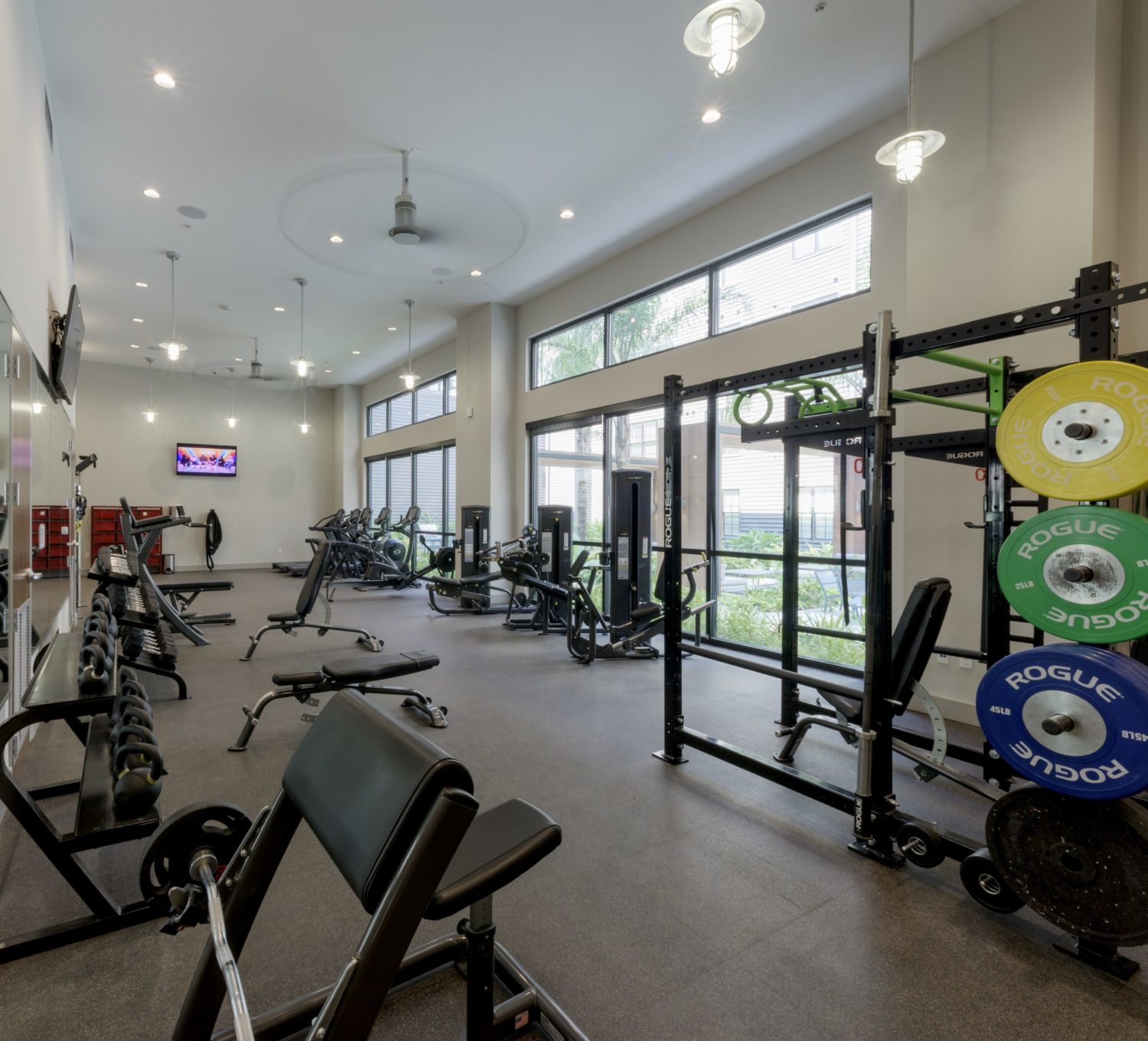 Fitness Center with weight equipment and ample natural light