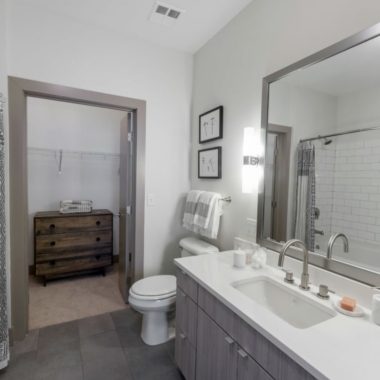 large bathroom with bathtub and modern finishes